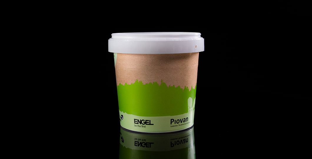 L'image montre un seau de 1 litre pour l'emballage alimentaire avec une épaisseur de paroi réduite et un étiquetage dans le moule.